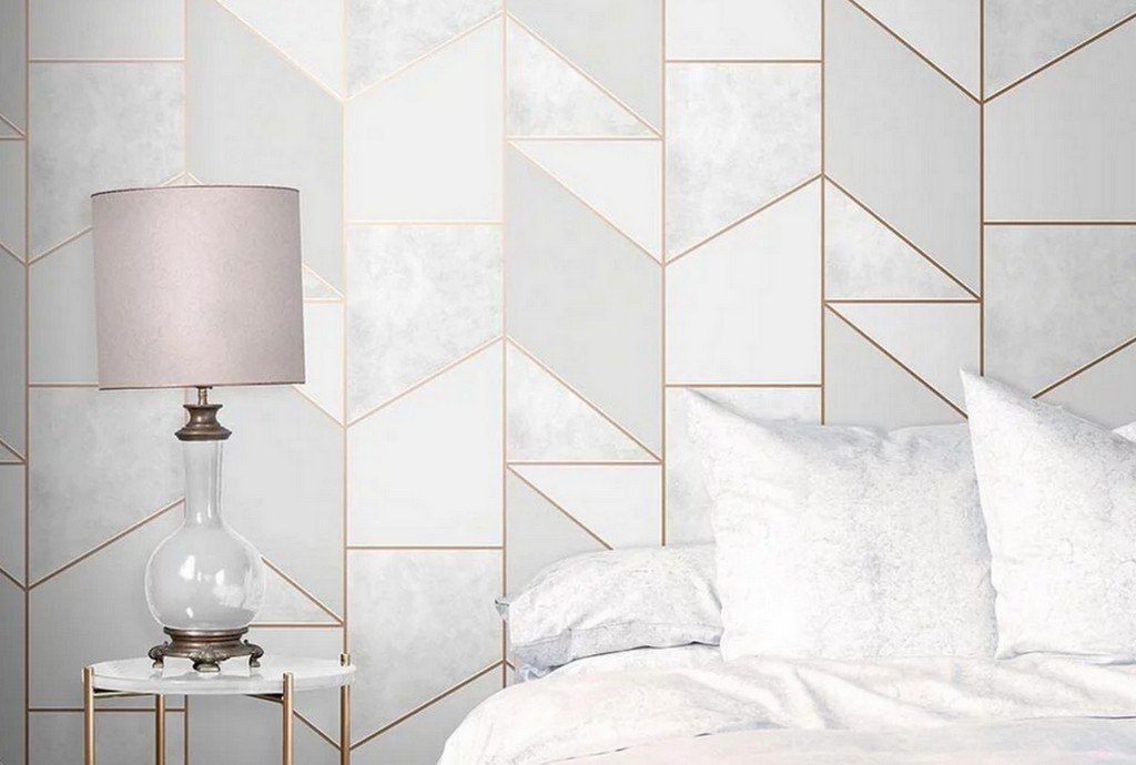 Colour block geo grey & rose, features a mix of ivory and grey background with rose gold inlay in a geometric pattern. A real art deco styled wallpaper classic.