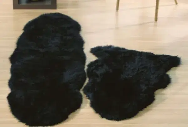 Black genuine sheepskin animal fur rug