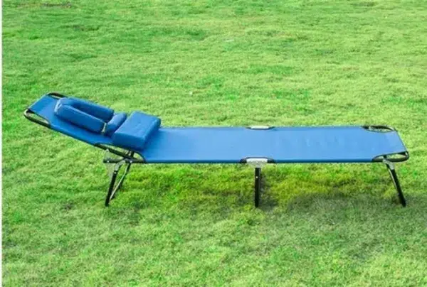 Blue sun lounger with reading hole & pillow