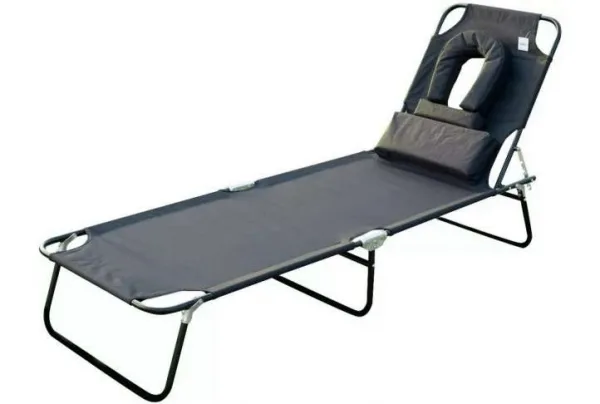 Black sun lounger with reading hole & pillow