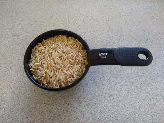Measure out half a cup of brown basmati rice