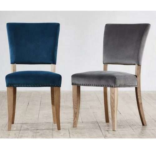 Globe pair of velvet dining chairs