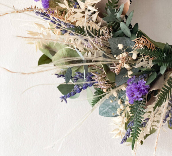 Preserved foliage wreath with purple flowers - image 3