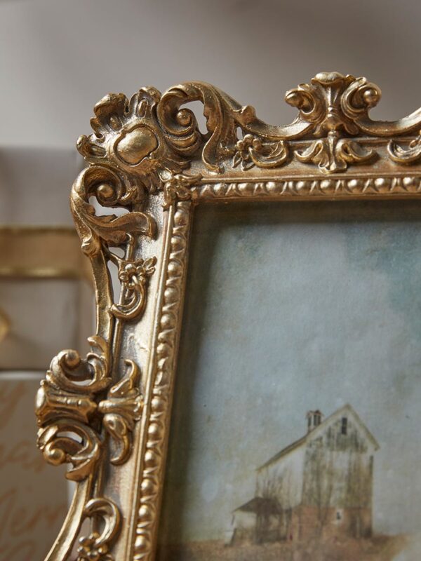 Golden filigree photo frame