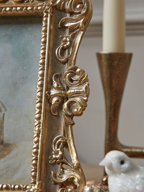 Golden filigree photo frame