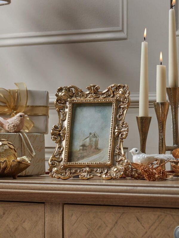 Golden filigree photo frame