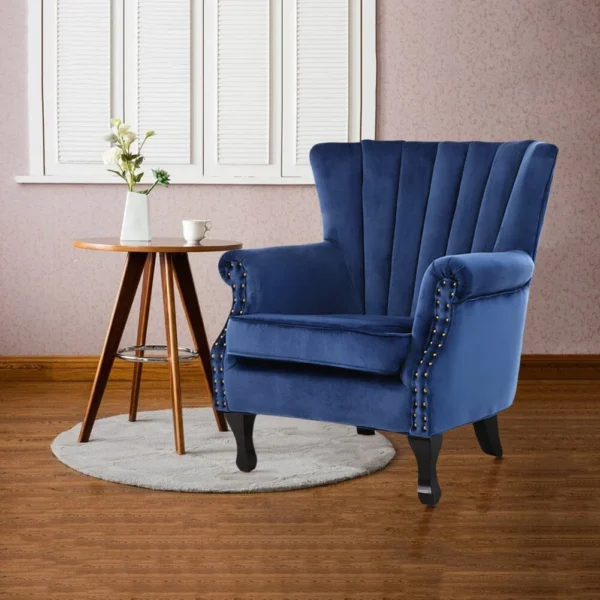 Blue velvet wingback armchair