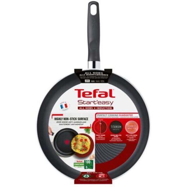 A black frying pan with a handle