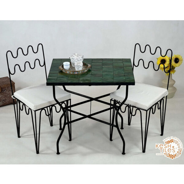 a table with a green rectangular object